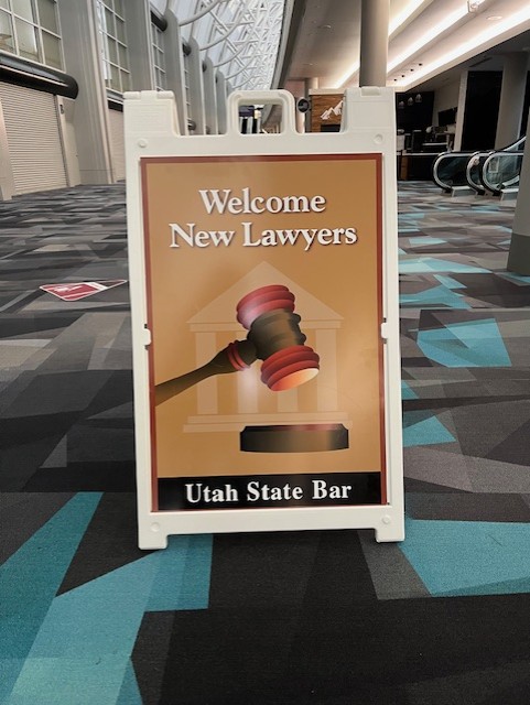 Sign that reads Welcome New Lawyers Utah State Bar